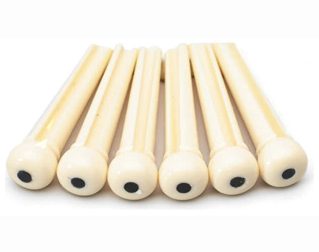 Clavija de puente de plástico marfil con punto negro (juego de 6)