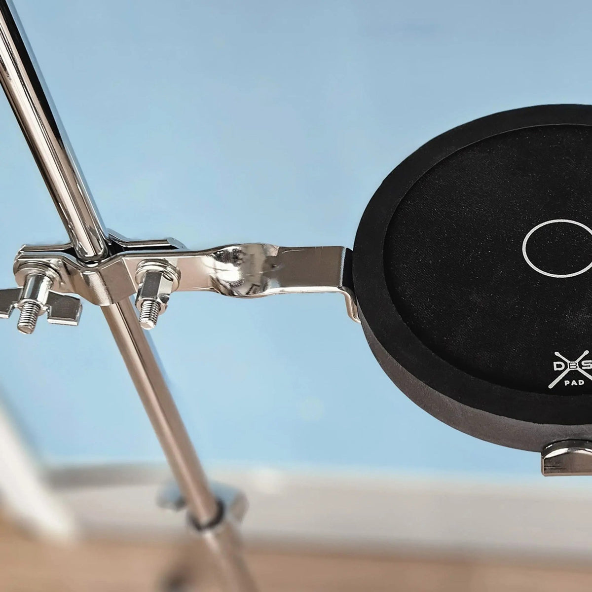Soporte PadGrip para pad de prà¡ctica montado en soporte